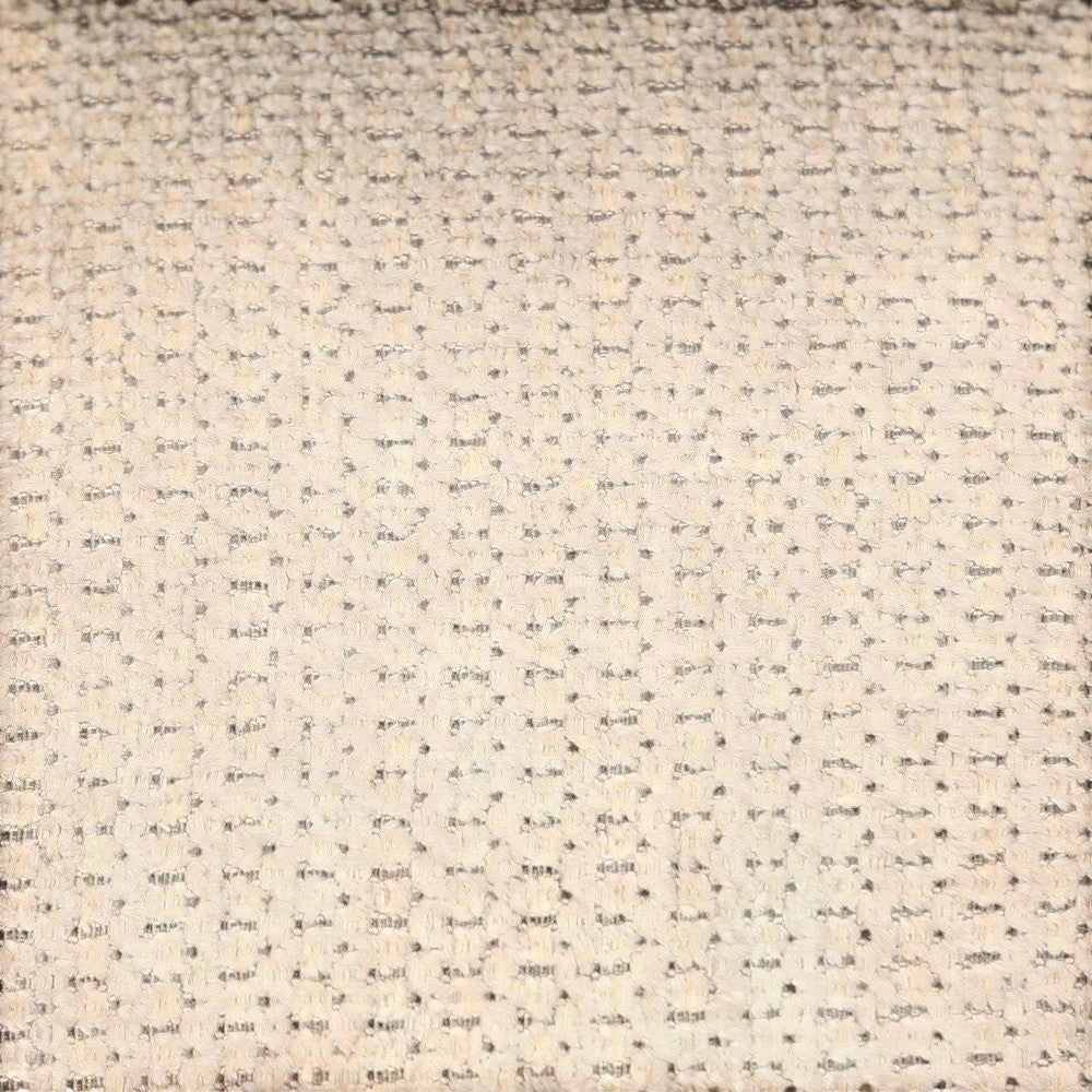 Gros plan sur le tissu texturé camel du pouf ZAGO STORE, mélange de polyester et nylon au toucher doux et actuel.